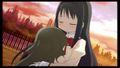 CG from the PSP game, depicting Homura comforting a crying Hitomi.