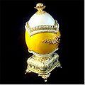 A European-style music box comprising of a carved egg. Made in China.