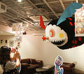 A giant Charlotte from the interior of the Madoka Magica Cafe