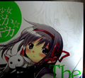 Madoka is also on the cover, but can only be seen up-close