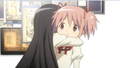 A tender and emotional hug with a very surprised Madoka. Notice she is not pushing Homura away